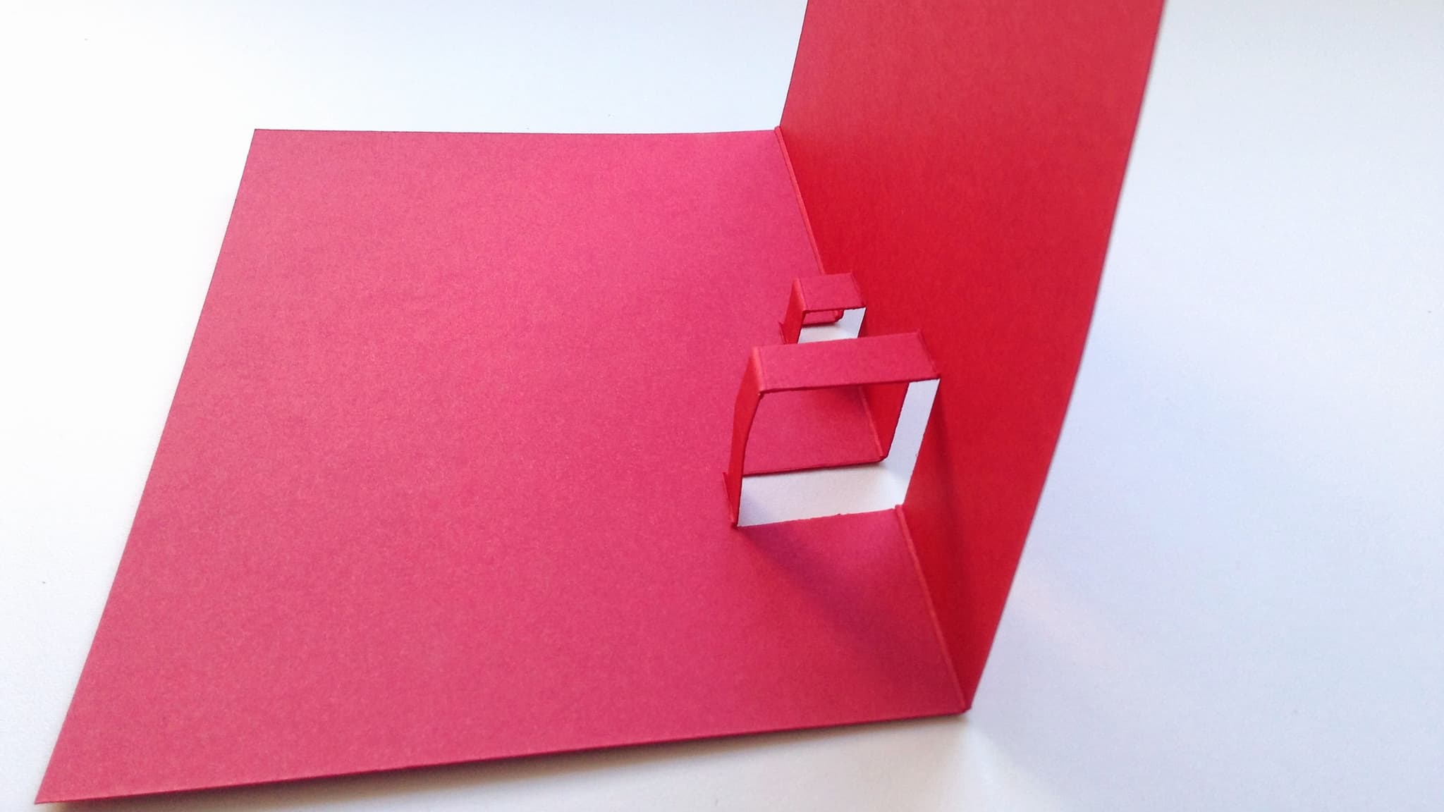 Fold the pop-out supports from the Valentine's card