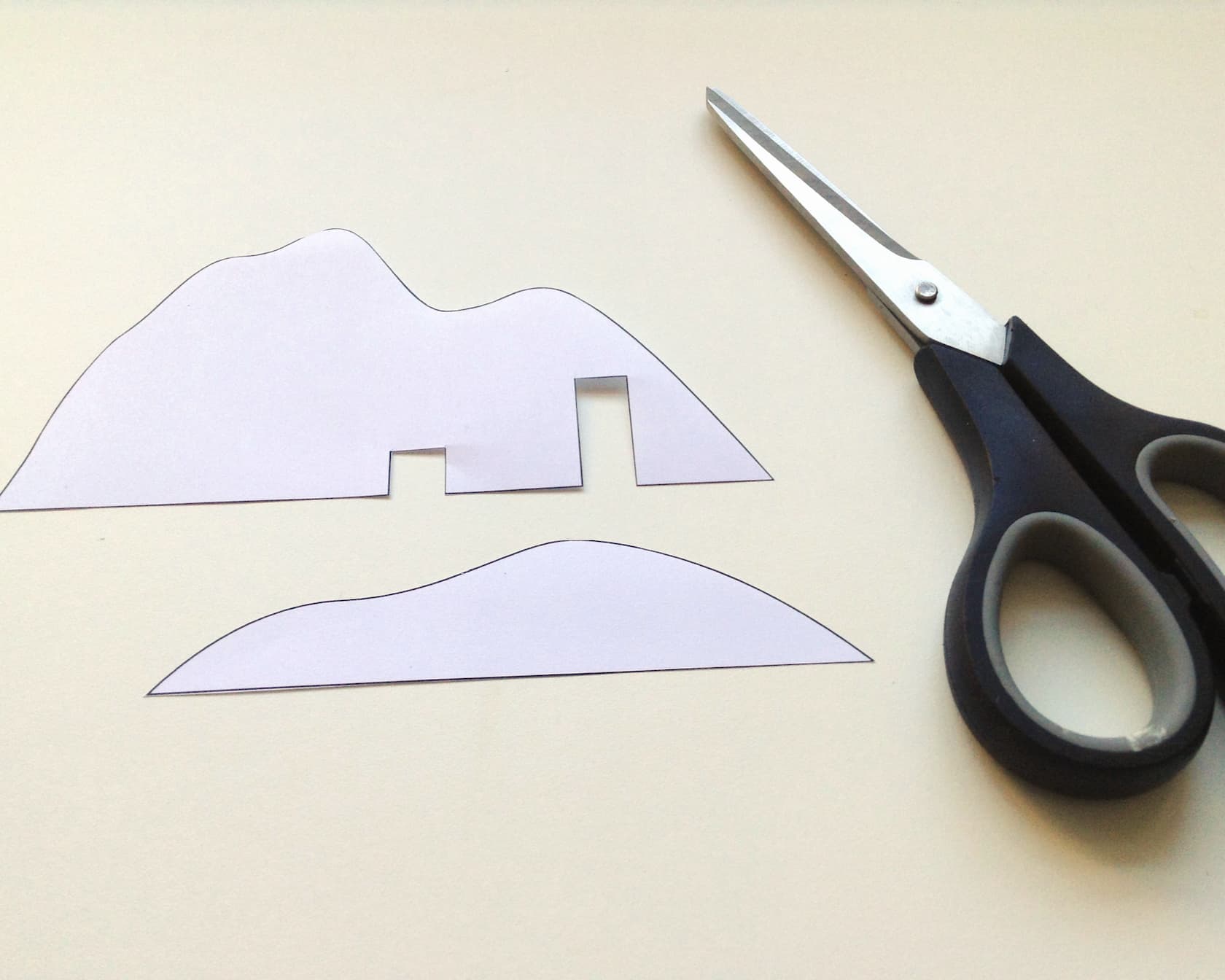 Cut out the mountain shapes