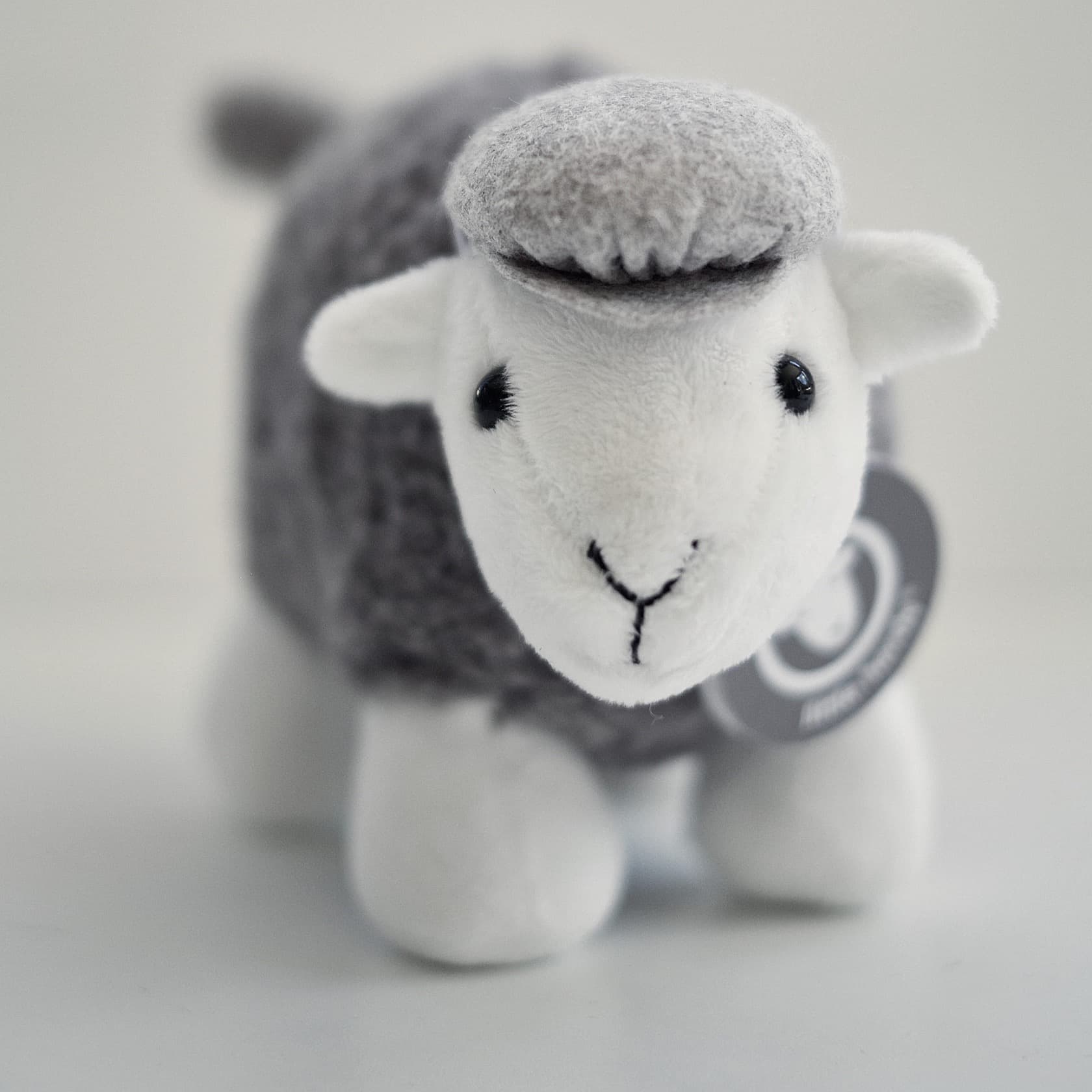 Little Herdy Soft Toy in a mini flat cap