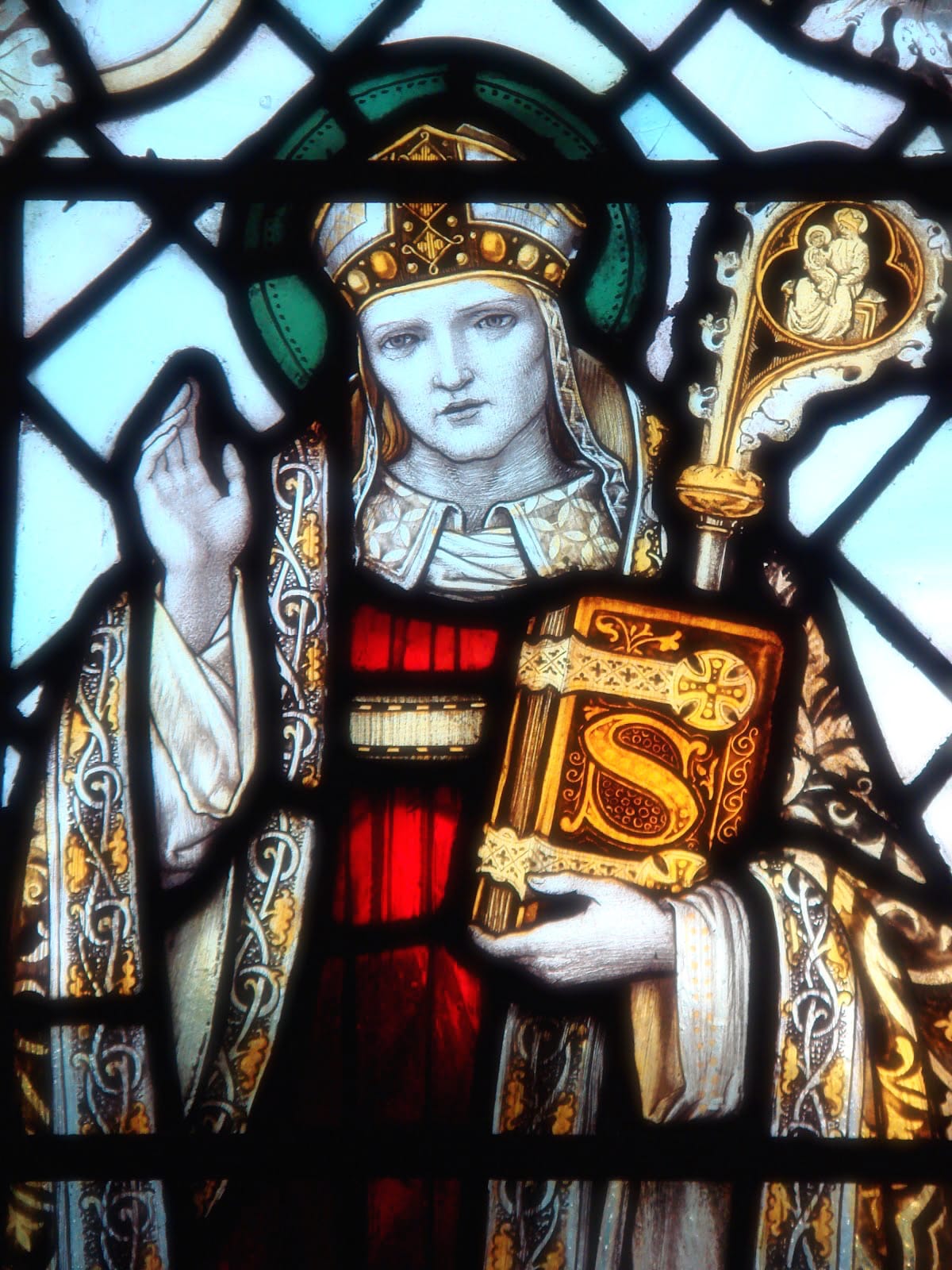 A stained glass depiction of St. Swithun