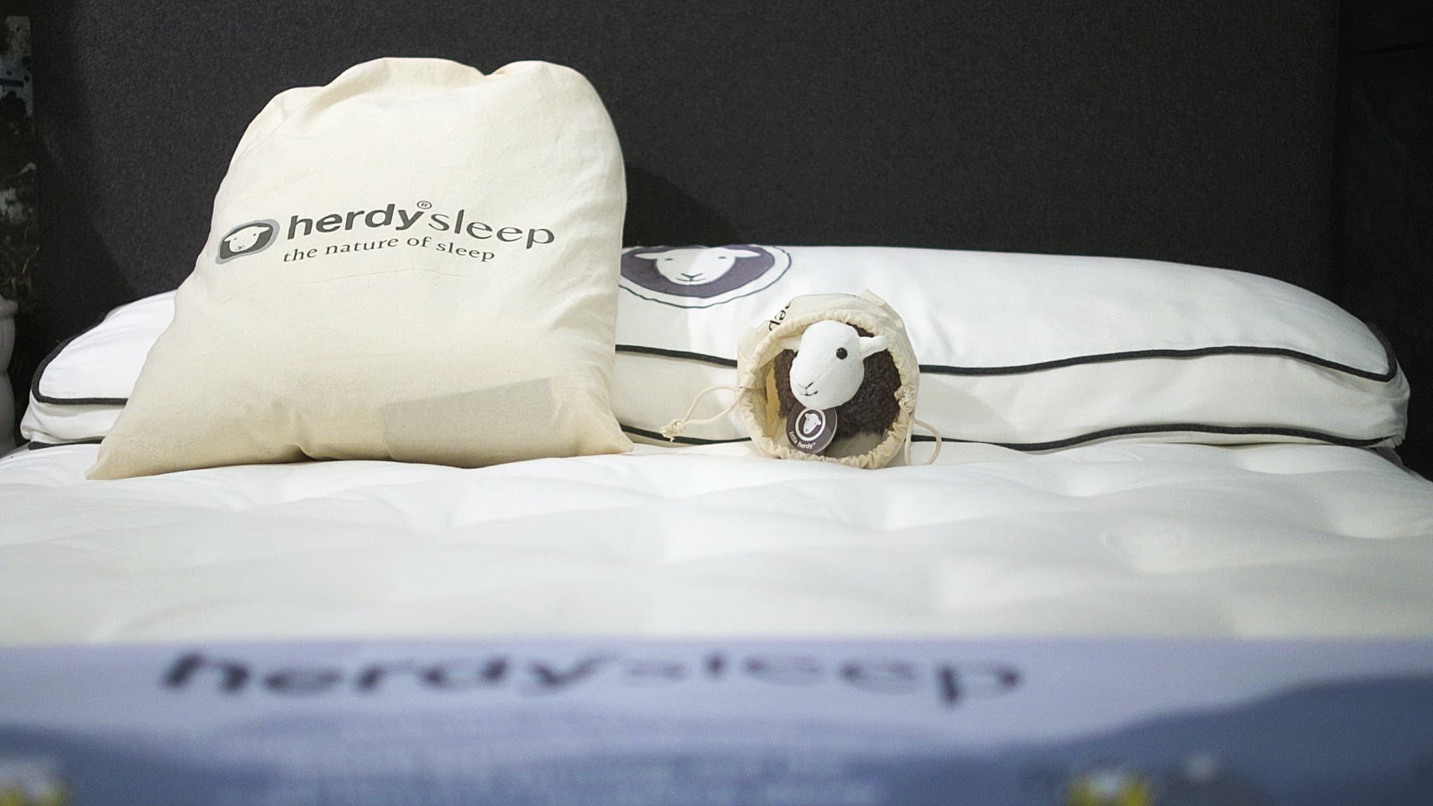 Little Herdy likes using a pillow cover as a sleeping bag on this Herdysleep mattress...