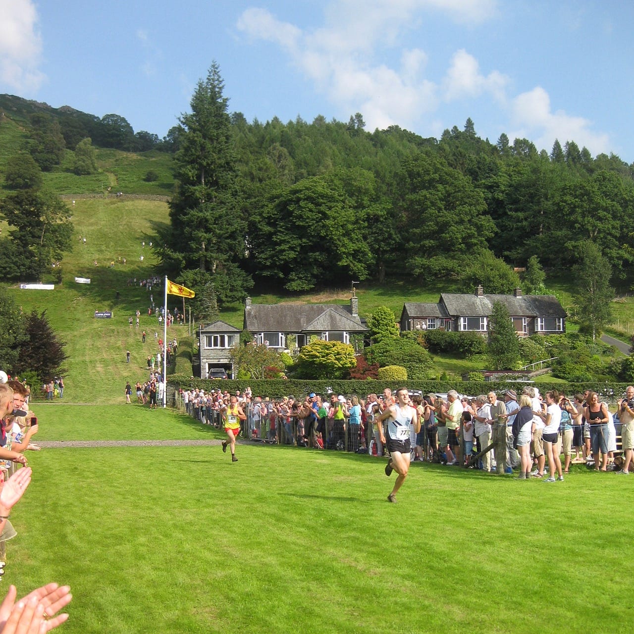 Fell runners finish coming off the fells at the Grasmere Sports Day. Photo by Wolf Gang