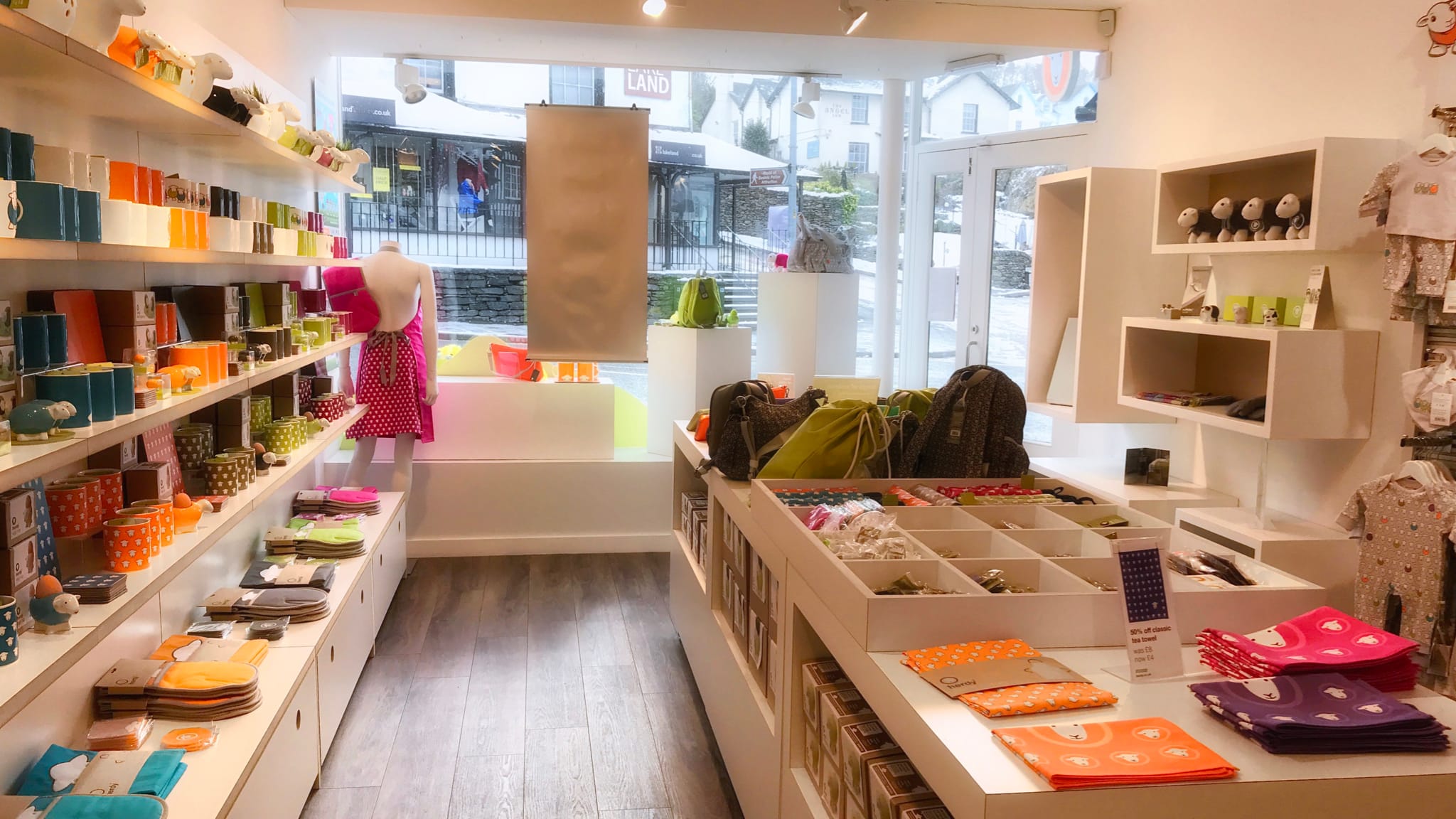 Inside the Herdy Bowness shop, surrounded by colourful Herdy products.