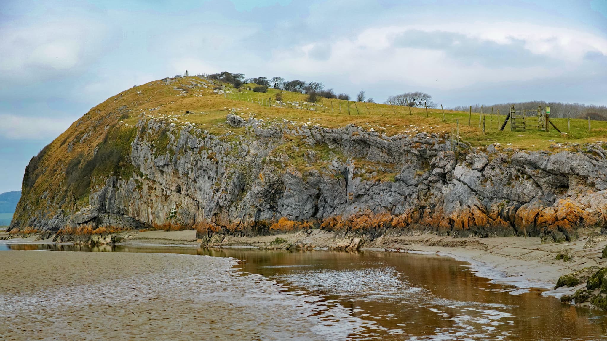 Humphrey Head, a promontory of limestone sticking out into Morecambe Bay from the Cumbrian Coast. Photo by Andrew ARG, licensed CC-BY-2.0