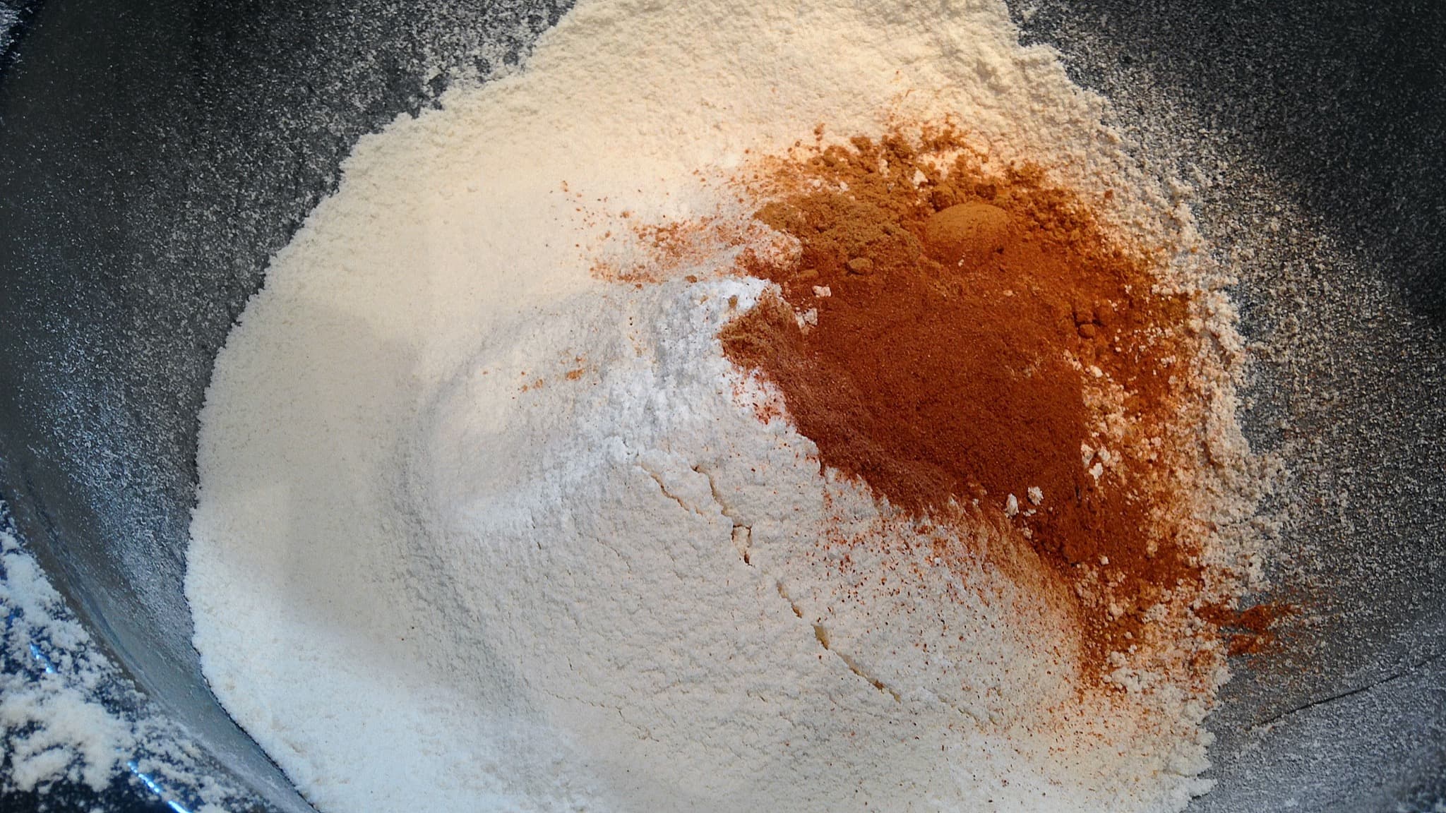 Mixing the dry ingredients together when making Christmas gingerbread