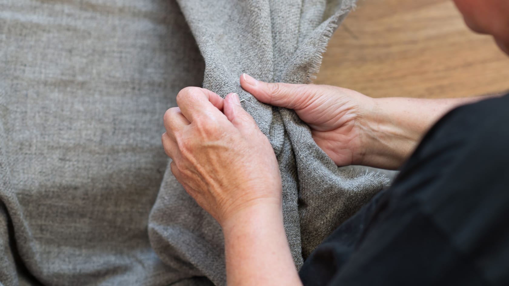 Menders inspect every inch of the fabric that comes off the loom and manually fix any snags