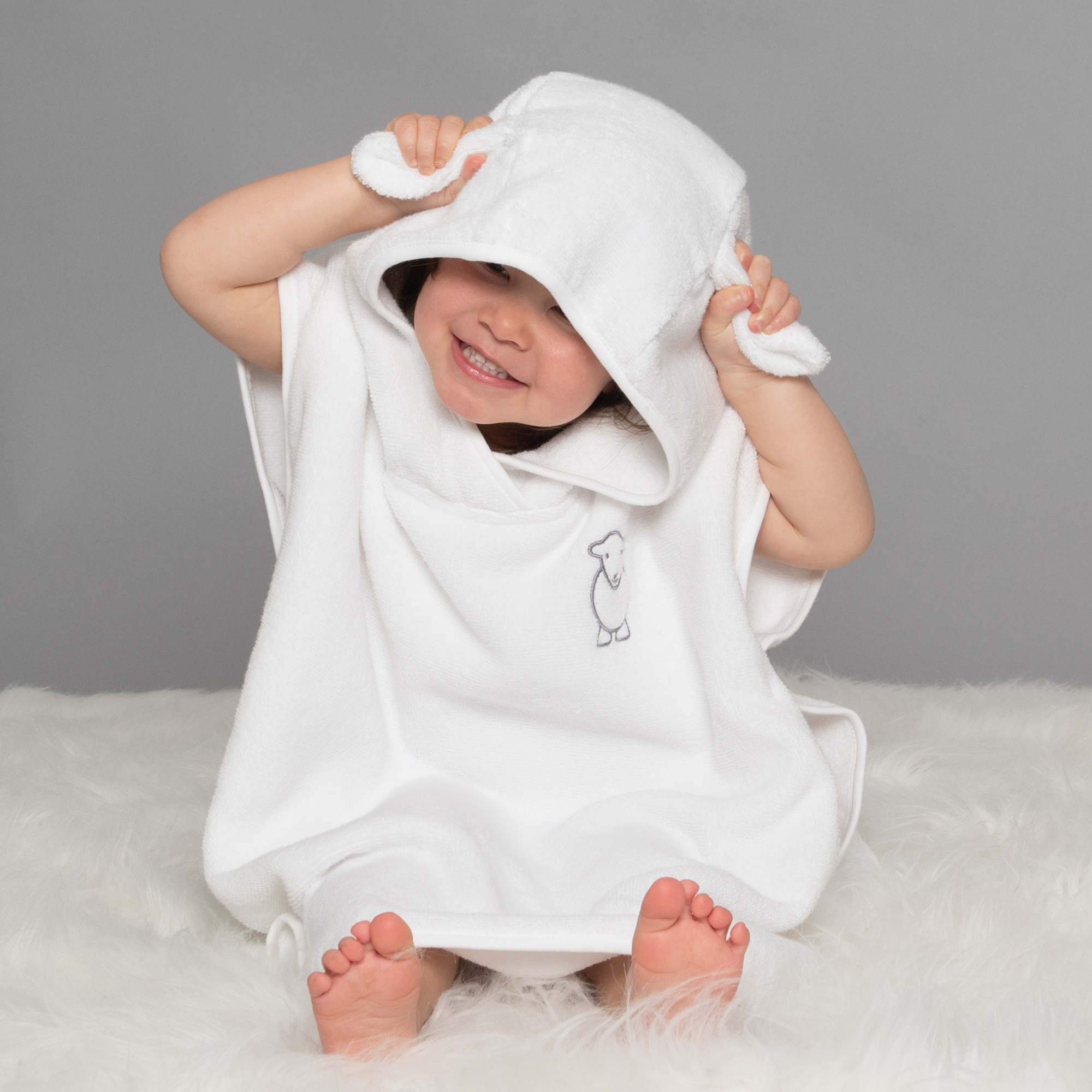 Square-up-socials-Poncho1 Herdy Baby Poncho